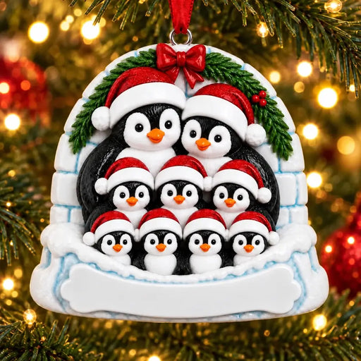 Personalized Resin Penguin Family of 9 Igloo Christmas Ornament, WS6309-9, shown in a Christmas setting with blank personalization areas.